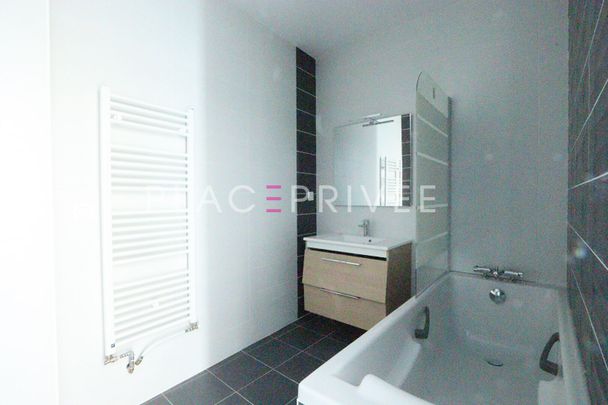 Appartement avec stationnement - Photo 1