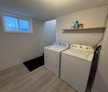 Central – 2 bed, 1 bath main floor suite - Photo 6