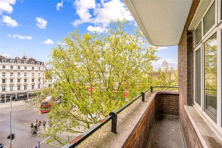 This is a beautifully refurbished 3 bedroom, 3 bathroom lateral flat in a popular mansion block in the heart of South Kensington. - Photo 5