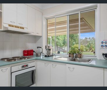 Spacious Family Home with a large shed - Photo 6