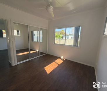 Location Meets Comfort: Bright & Modern 2-Bedroom - Photo 3