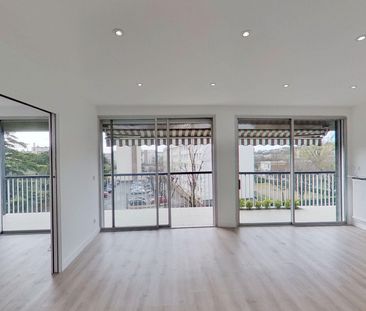 Location Appartement 5 pièces 101m² - Photo 3