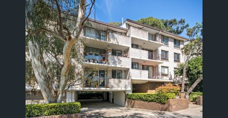 Spacious Two Bedroom Apartment with Parking in Ideal Location - Photo 4