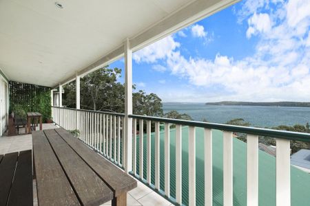 FULLY FURNISHED HOME WITH SPECTACULAR LAKE VIEWS - Photo 3