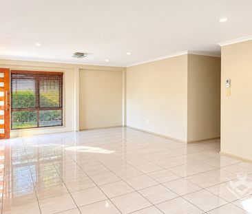 Three-Bedroom Home with Air Conditioning | Convenient Location in B... - Photo 1