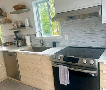 GRAND PPARTEMENT 4 1/2 SUR DEUX ÉTAGES - Photo 1