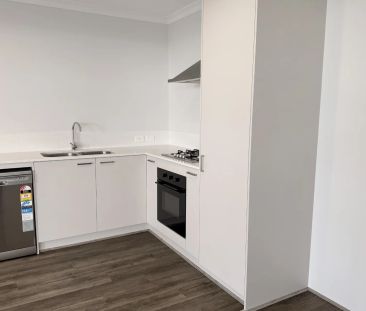 Low-Maintenance Brand New 2x1 Home Just Minutes from the Beach! - Photo 1