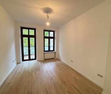 Charmante Altbauwohnung mit Stuckelementen und modernem Komfort - Photo 2