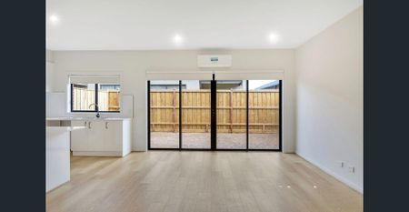 Beautifully Designed 4-Bedroom Family Home in Prime Location - Photo 5