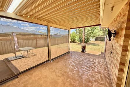 Charming 4-Bedroom Family Home with Relaxed, Low-Maintenance Living - Photo 4