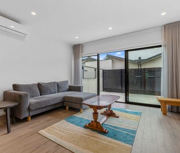 Stylish Two-Bedroom Townhouse in a Convenient Location - Photo 1
