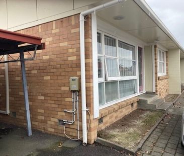 This generous two-bedroom unit offers an open-plan living area, two... - Photo 2