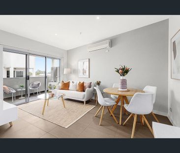 Modern Apartment in a Prime Location! - Photo 1