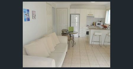 Beat the heat by the pool this summer in this 1 bedroom loft style property - Photo 3