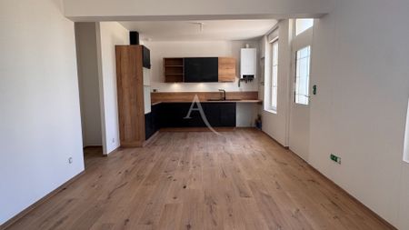 Location Maison 4 pièces 70m² - Photo 2