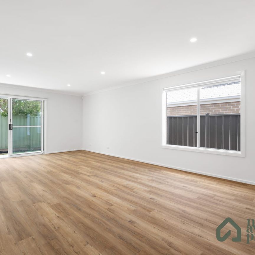 Spacious 4-Bedroom Family Home with Modern Comforts - Photo 1