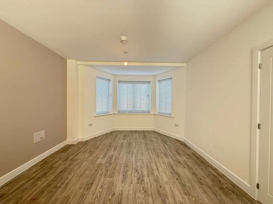 A stylish newly built four bedroom house with garage in Springstead Village. - Photo 1