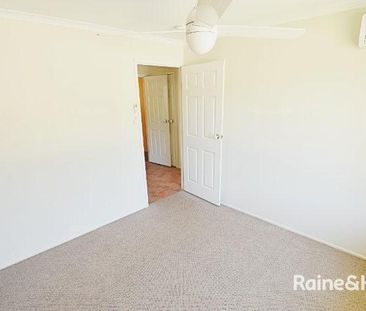THREE BEDROOM FAMILY HOME WITH LARGE OUTDOOR ENTERTAINEMENT AREA! - Photo 4