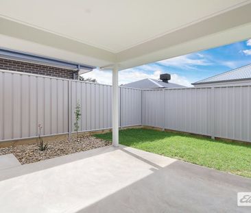 Brand new living with Park views! - Photo 5