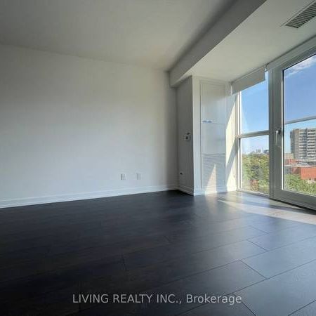 Feels brand new floor to ceiling windows! - Photo 1