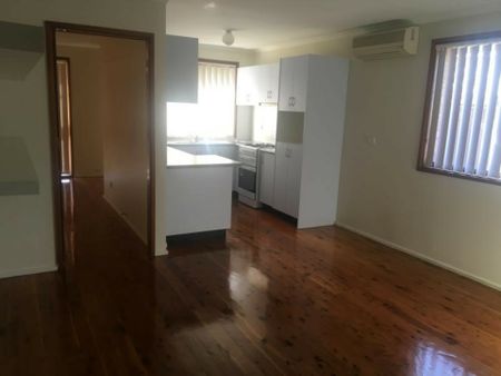 Charming 3-Bedroom Home with a Spacious Backyard! - Photo 3