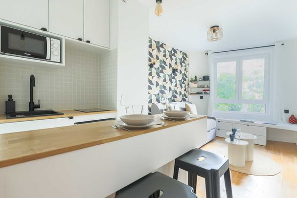 Rue Mesnil - Photo 1