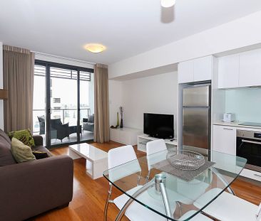 Top Floor Apartment with River Views! - Photo 1