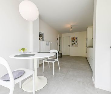 Ruim appartement met ondergrondse autostaanplaats - Photo 1