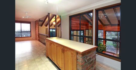 Spacious 4-Bedroom Home in a Quiet North Hill Location - Photo 5