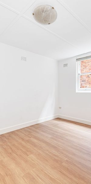 Renovated Two Bedroom Duplex in Convenient Location - Photo 1