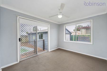 Spacious Family Home with Pool, Double Shed & Ample Parking - Photo 3
