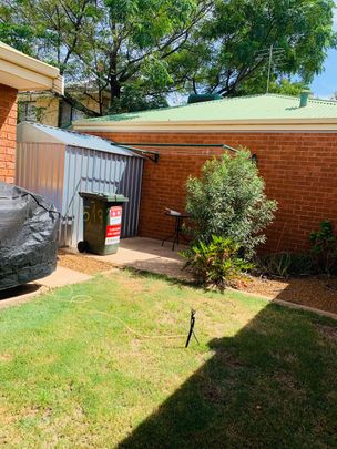 FULLY FURNISHED SECURE UNIT IN THE CBD! - Photo 1