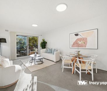 Roomy two bedroom unit located in quiet security block! - Photo 2