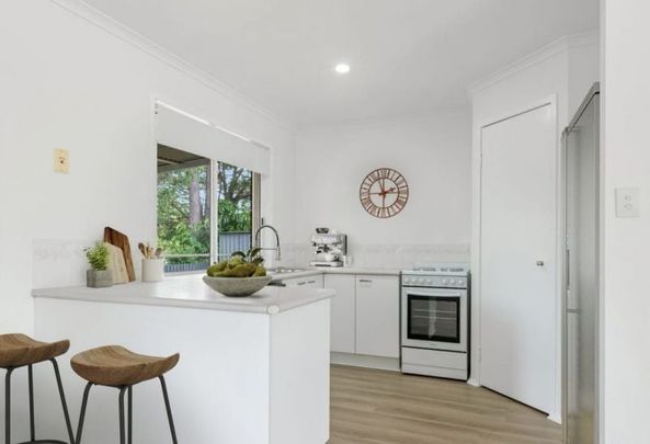 Fully Renovated Family Home on a Prime Corner Block - Photo 1