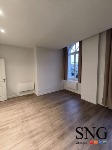 T1 RENOVE AVEC TERRASSE ET PARKING - Photo 2