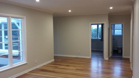 Charming 3BR Home with Deck & Garden - Photo 2