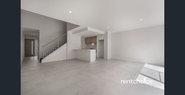 Modern Lock up and leave in Peaceful Pocket of Orelia - Photo 1