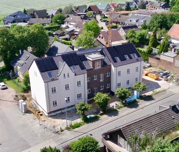 Ein architektonisches Highlight: Wohnen im historischen Schulgebäude mit modernster Technik! - Photo 3