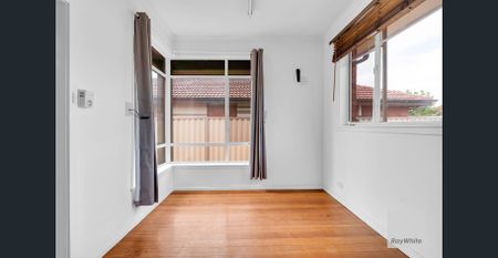 Charming 3-Bedroom Home with Large Fenced Yard and Prime Location - Photo 2