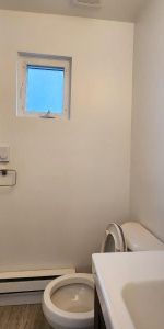 One Bedroom Ground Level Suite Including Utilities and One Parking Space - Photo 4