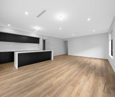 Spacious 4-Bedroom Family Home with Modern Features - Photo 1