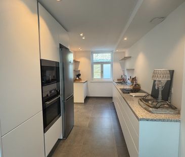 Te huur: volledig vernieuwde, instapklare rijwoning - Foto 1