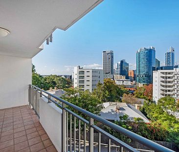 Convenient City Lifestyle in a Prime Location - Photo 1