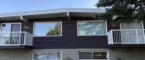 Large 4 bedroom duplex | 7331 - 7329 Huntertown Crescent Northwest, Calgary - Photo 1