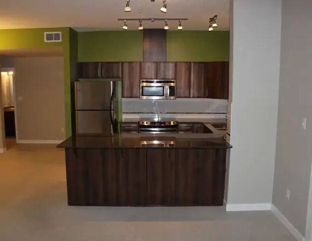 Beautiful Two Bedroom + Den Downtown Condo with TWO UG Heated Parking stalls | Edmonton - Photo 1