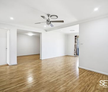 Perfect Family Home with Ducted Air Conditioning - Photo 4