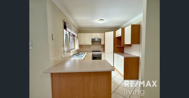 4-Bedroom Home with Three Bay Garage in the heart of Bray Park - Photo 1