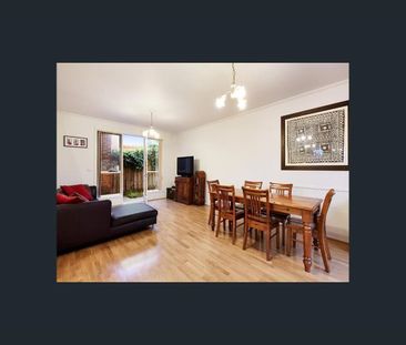 Well-Maintained Townhouse with Fresh Updates in Prime Location - Photo 5