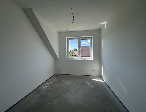 Vermietung: Erstbezug, moderne Obergeschosswohnung mit Balkon und Carport in Westoverledingen - Foto 1