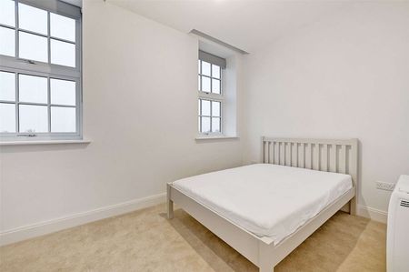A one bedroom and part-furnished apartment in the Horlicks Factory Building by Berkeley Homes. - Photo 5